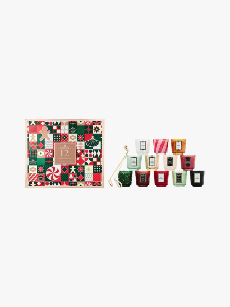 Voluspa 12 Day Advent Calender in multiple branded components on a light gray background