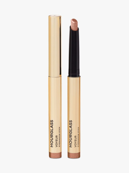 Hourglass Voyeur Eyeshadow Stick gold eye shadow stick on light gray background
